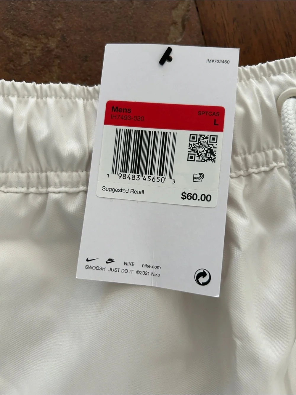 Nike Men’s White Swim Trunks with Subtle Logo
